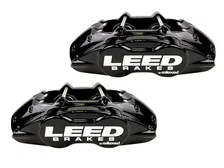Front Caliper and Rotor Kit with Drilled Rotors and Black Powder Coated Calipers image 2