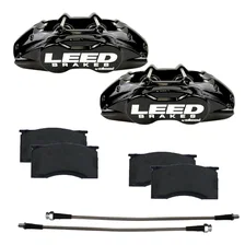 Front New fully tested loaded caliper with stainless steel pistons black powder coated pair image 1