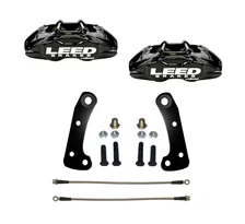 Front New fully tested loaded caliper with stainless steel pistons black powder coated pair image 1
