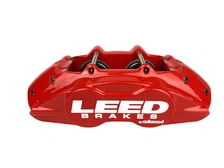 Front New fully tested loaded caliper with stainless steel pistons red powder coated pair image 4
